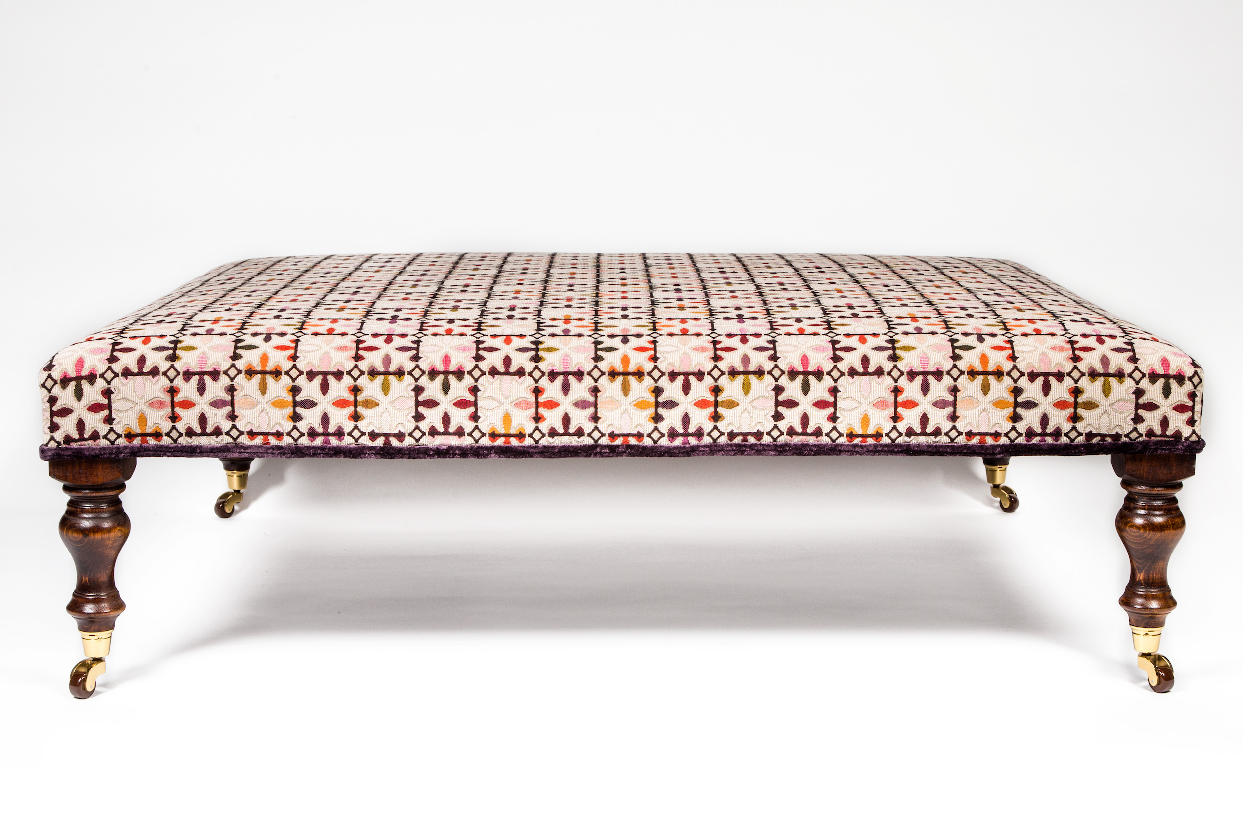 Slender Table Stool with Double Piping and Turned legs with Castors.